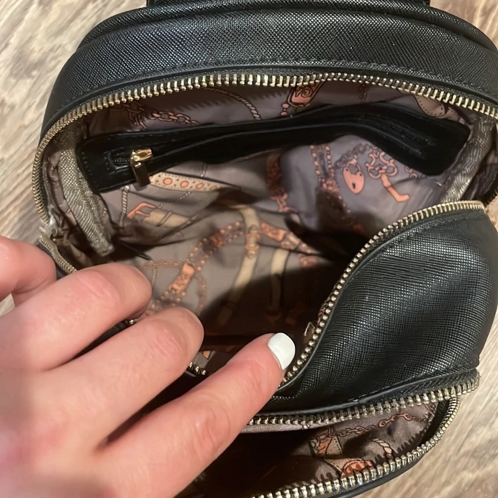 Fashion Inspired Black Leather Bucket Bookbag With Chain Detail